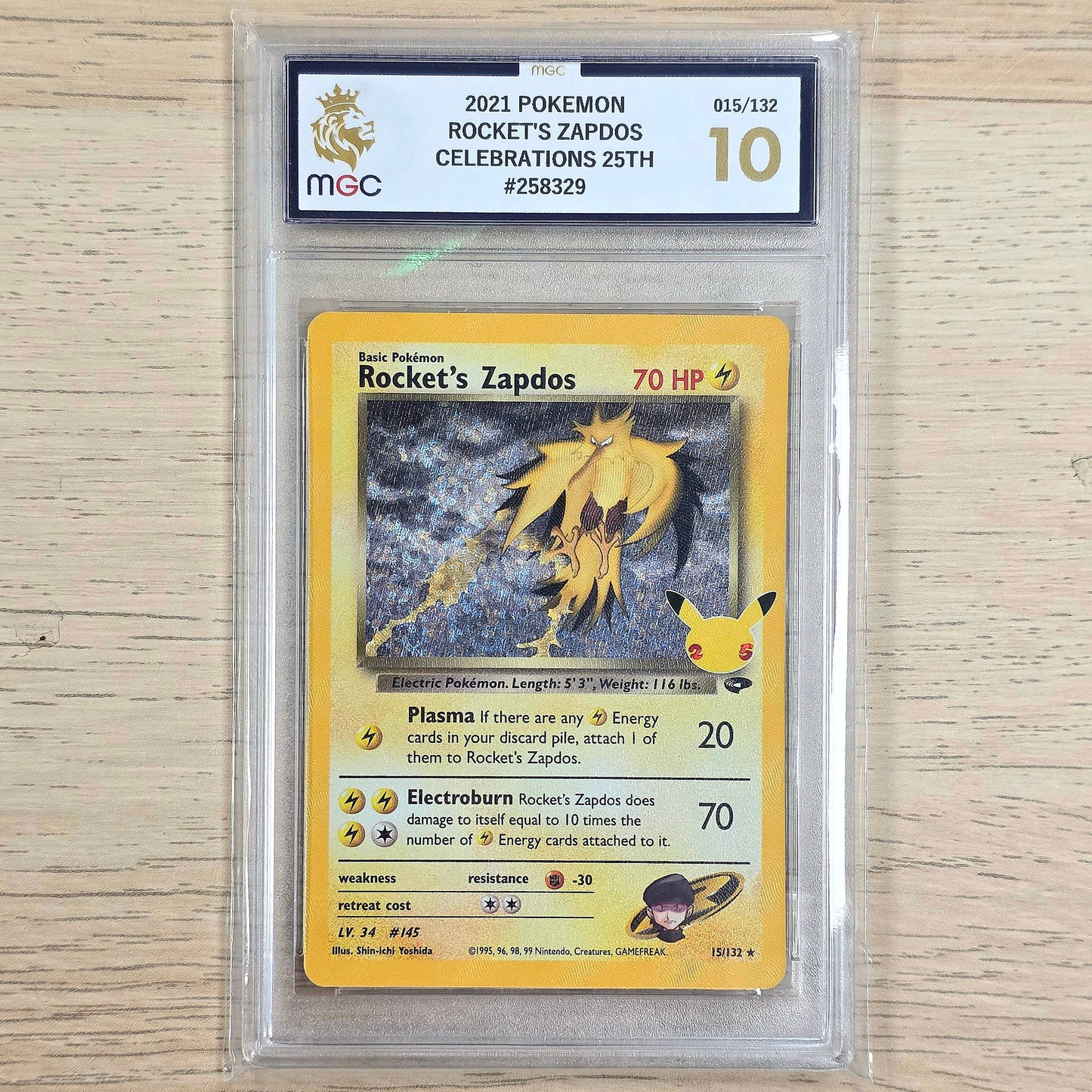 Pokemon TCG Rocket's Zapdos Celebrations 15/132 (MGC 10)