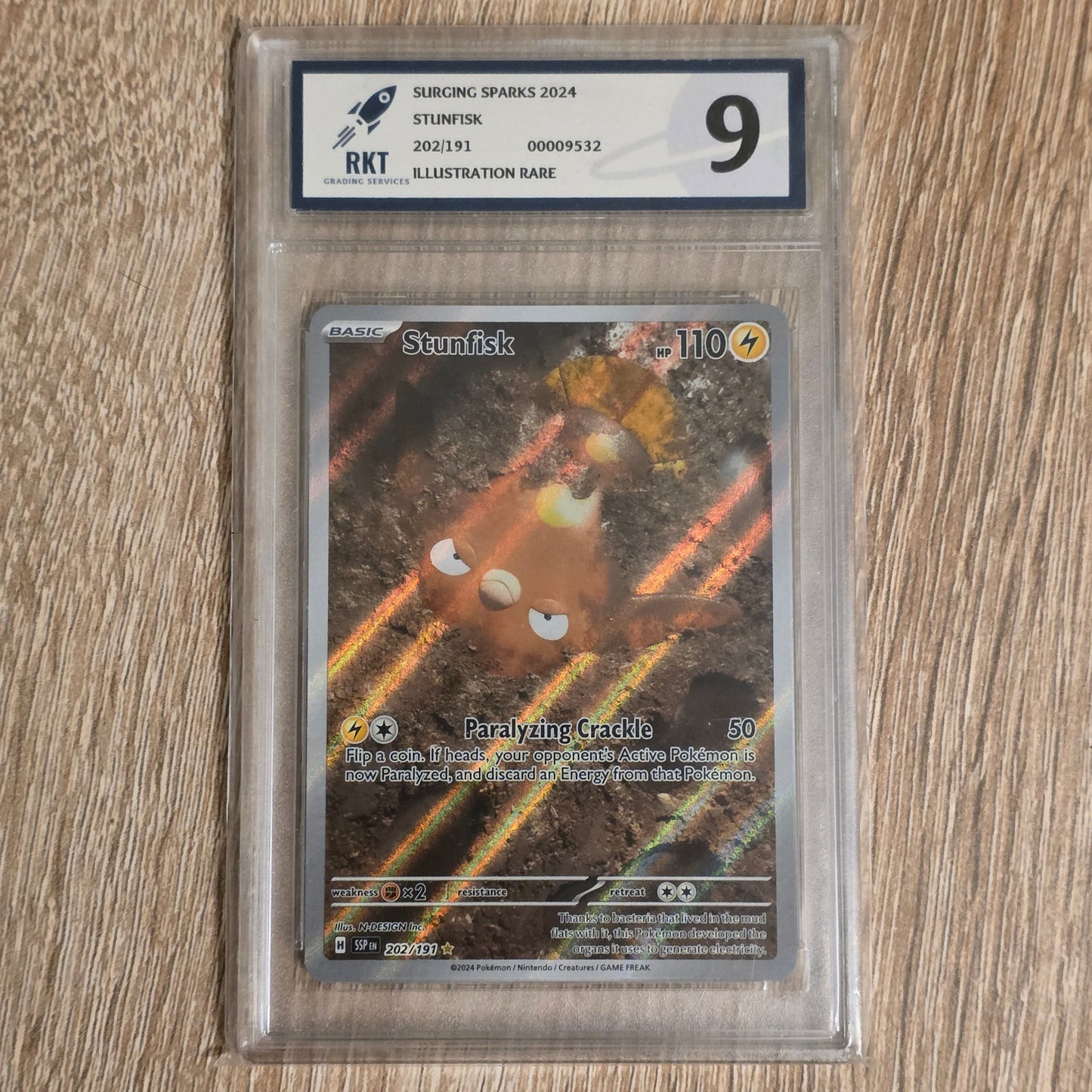 Pokemon TCG Stunfisk Surging Sparks 202/191 (RKT 9)