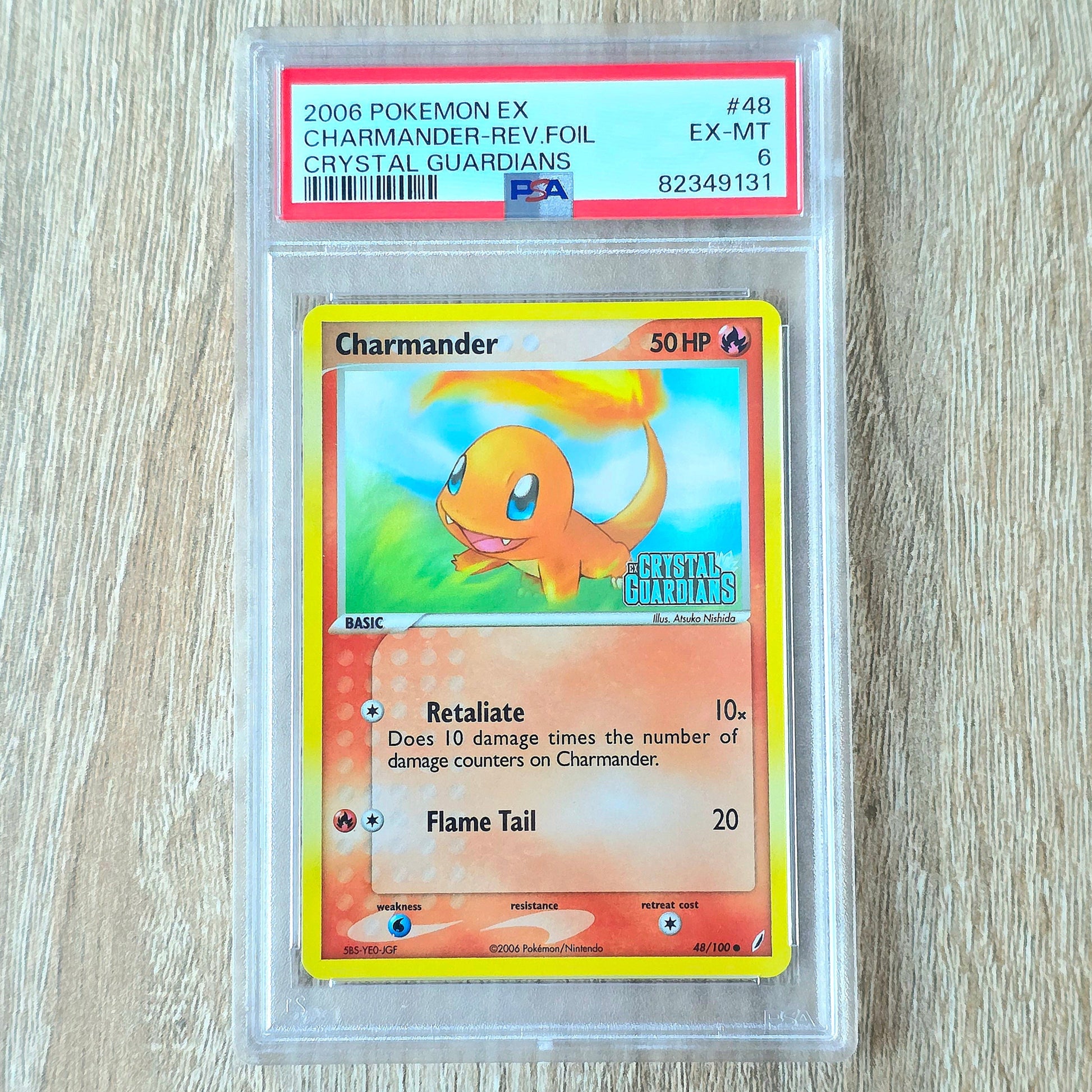 Pokemon TCG Charmander *Reverse Holo* Crystal Guardians 48/100 (PSA 6)