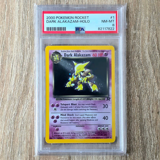 Pokemon TCG Dark Alakazam *Holo* Team Rocket 1/82 (PSA 8)