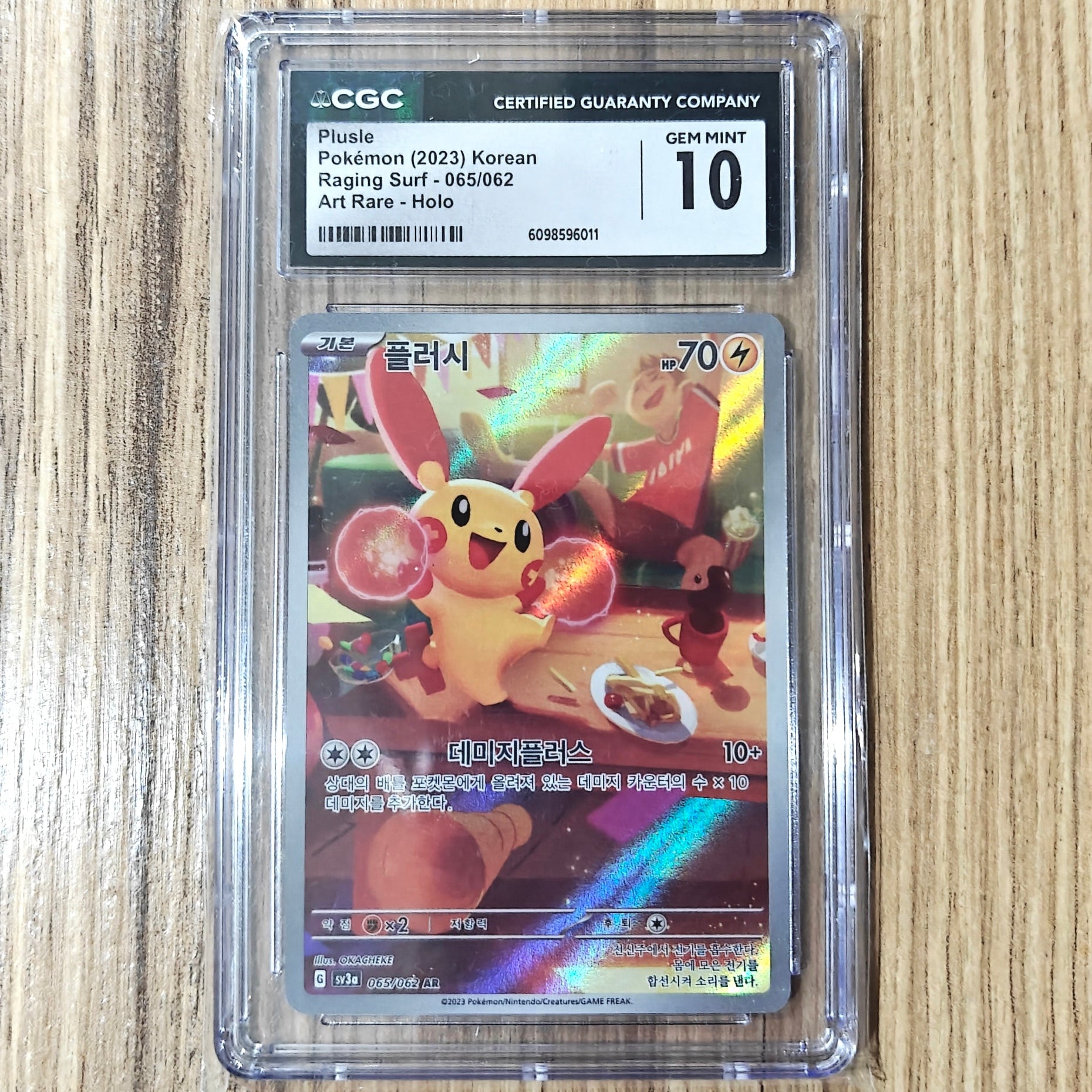 Pokemon TCG Plusle Raging Surf 065/062 (Korean) (CGC 10)